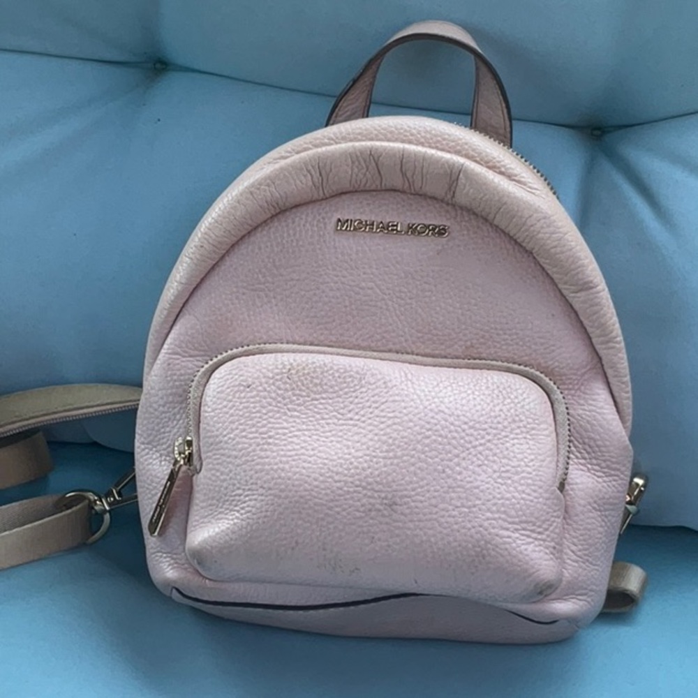 Michael Kors Pink Fashion Backpack with Minimalist Design
